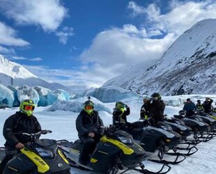 SNOWMOBILING ADVENTURES IN THE ARCTIC